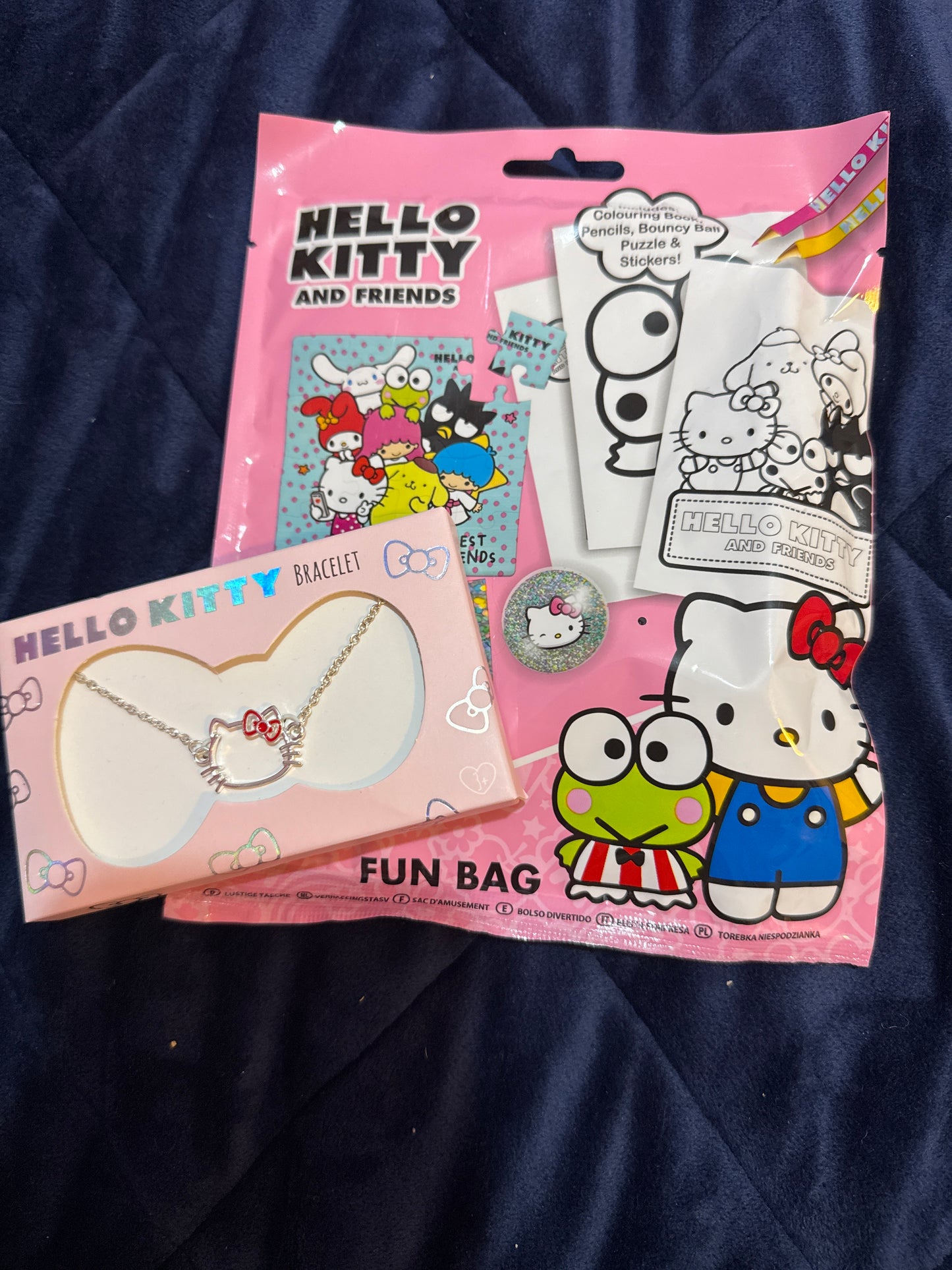 Hello kitty fun bag and charm bracelet