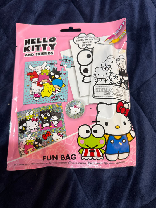 Hello kitty fun bag and charm bracelet