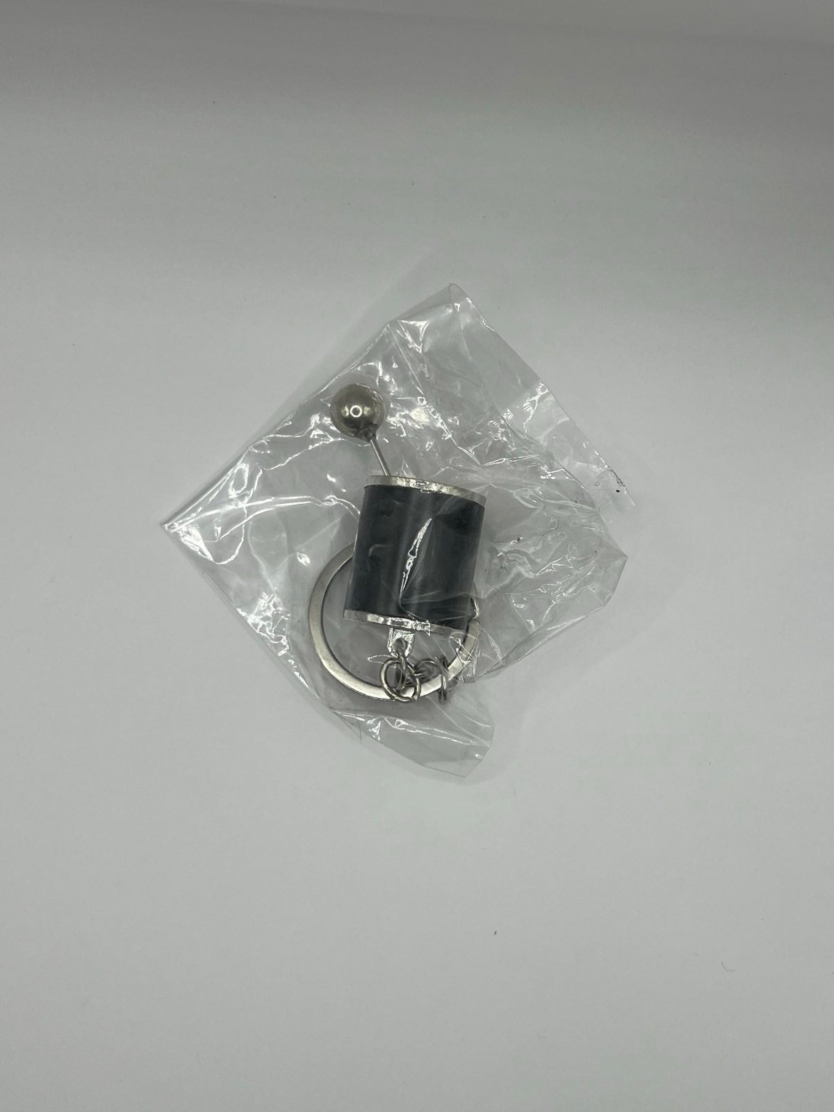 Keychain gear stick