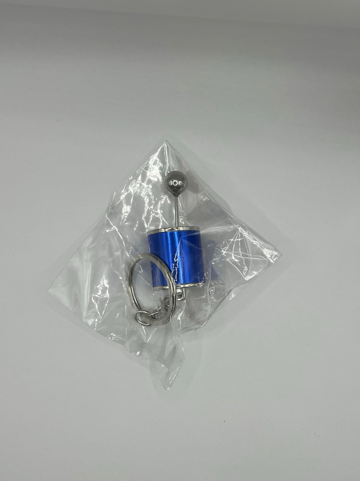 Keychain gear stick